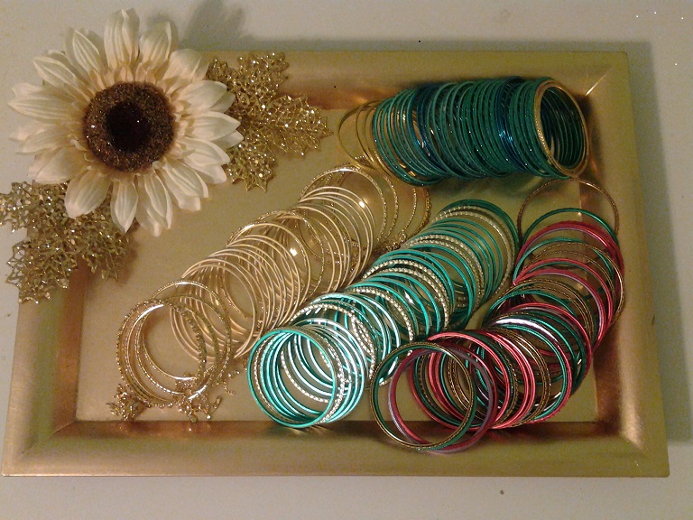 Decorated tray for bangles
